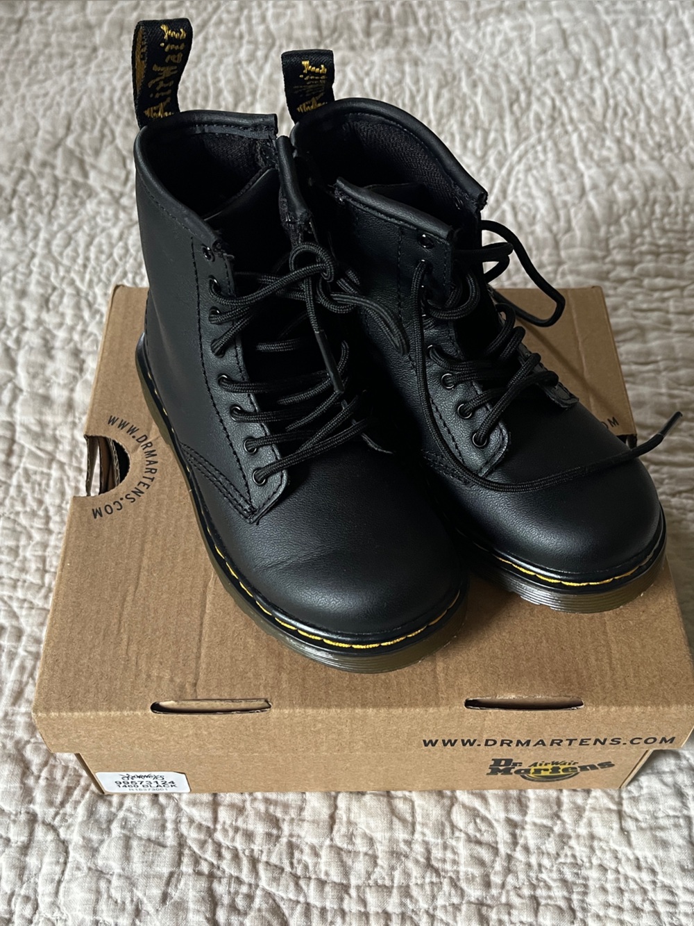Kids Dr. Martens Black Leather Lace-Up Combat Boots with Yellow Stitching